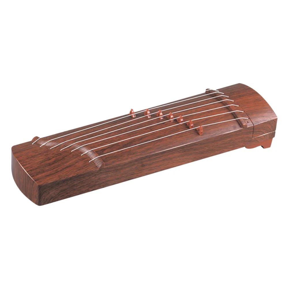Guzheng  Ǳ 峭,  â 
